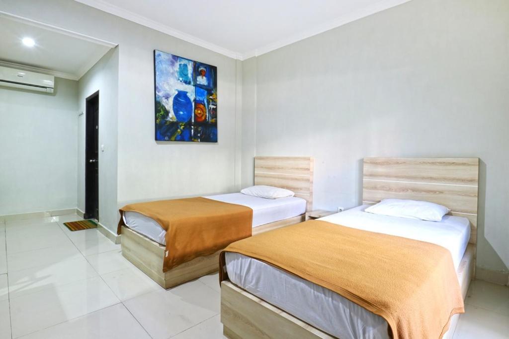Palm Garden Kuta Hotel Kuta  Bagian luar foto